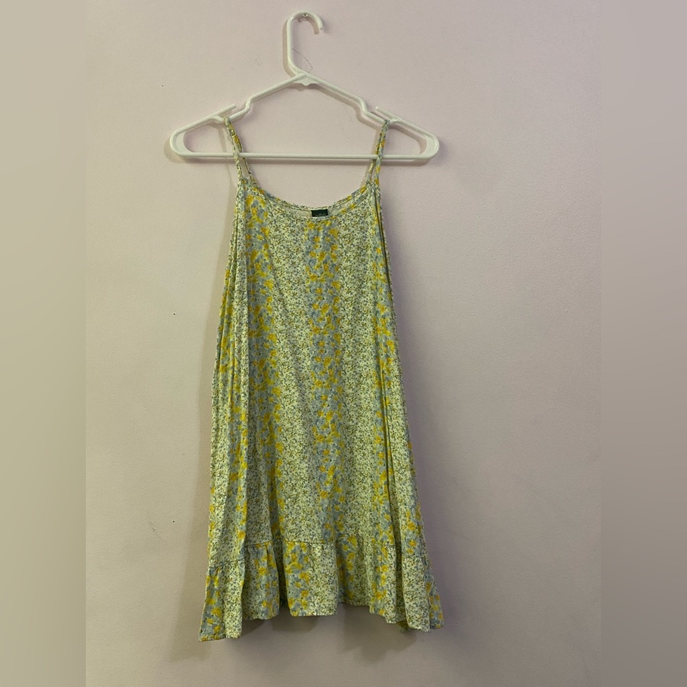 floral pattern sundress, spaghetti strap adjustable sleeves, ruffle detail